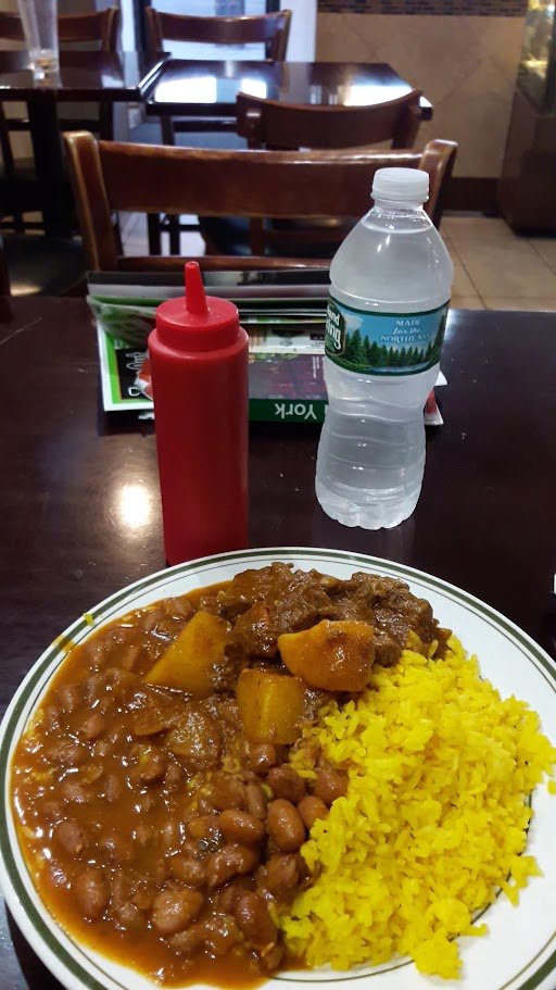 Latin American restaurant interior with counter service.
